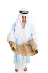 Image showing Biblical man or scribe reading holy torah scroll