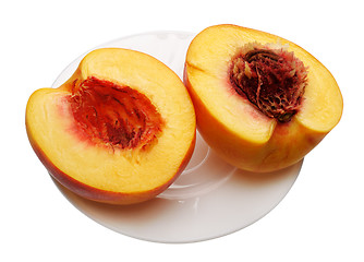 Image showing Sliced peach on the plate, isolated 
