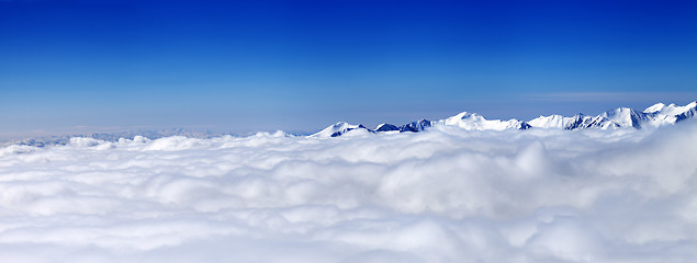 Image showing Panorama of mountains under clouds at nice sun day