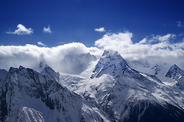 Image showing Mountain peaks in clouds