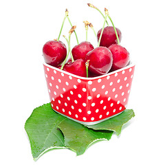 Image showing Summer dessert ripe cherry wet with drops berries