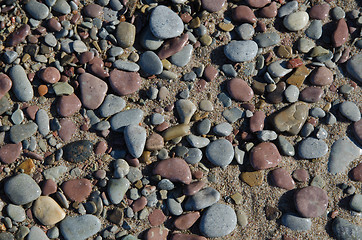 Image showing Background of wet pebbles and sand