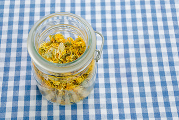 Image showing jar of dried organic herbal healing calendula 