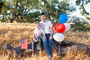 Image showing family celebrating 4th of July