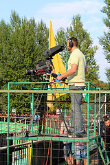 Image showing teleoperator shooting a football game