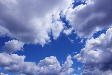 Image showing picturesque white clouds on blue sky background