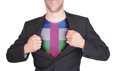 Image showing Businessman opening suit to reveal shirt with flag