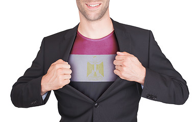 Image showing Businessman opening suit to reveal shirt with flag