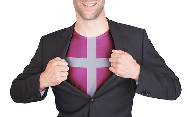 Image showing Businessman opening suit to reveal shirt with flag