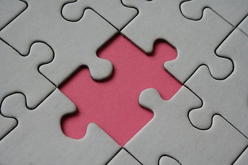 Image showing Final pink jigsaw piece