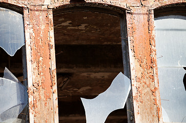 Image showing Wall of old destroyed house with broken windows