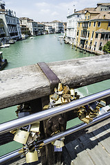 Image showing Padlocks of lovers placed on the bridge