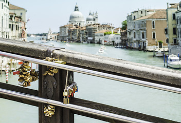 Image showing Padlocks of lovers placed on the bridge