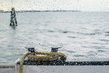 Image showing Rain on glass ship