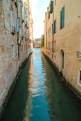 Image showing Ancient buildings in the channel in Venice.
