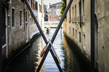 Image showing Padlocks of lovers placed on the bridge