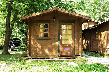 Image showing Wooden bungalows on campsite camping