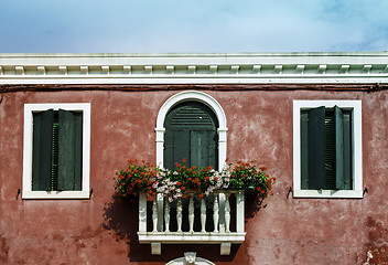 Image showing Venetian windows with flowers