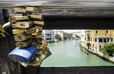 Image showing Padlocks of lovers placed on the bridge