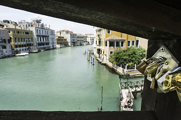 Image showing Padlocks of lovers placed on the bridge