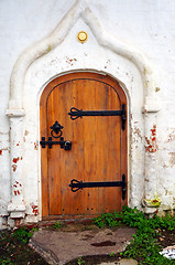 Image showing Closed wooden door - Detail of old white church