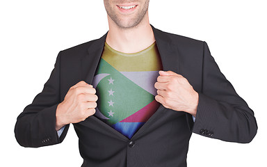 Image showing Businessman opening suit to reveal shirt with flag