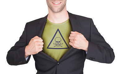 Image showing Businessman opening suit to reveal shirt with sign