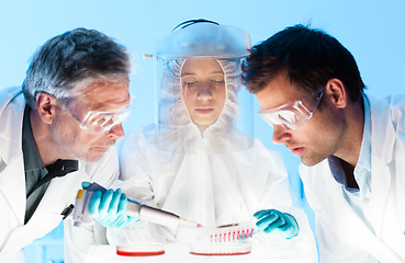 Image showing Life scientist pipetting.