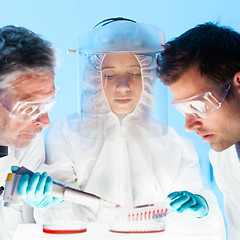 Image showing Life scientist pipetting.