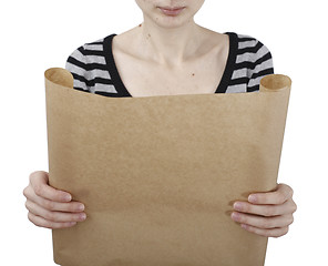 Image showing Woman holding a paper