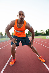 Image showing Runner Stretching His Legs