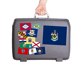 Image showing Used plastic suitcase with stains and scratches