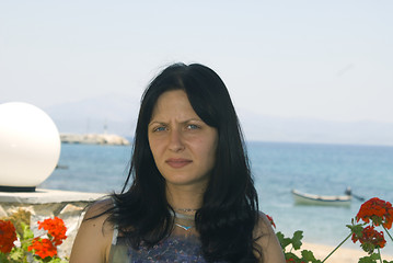 Image showing attractive young woman in cafe