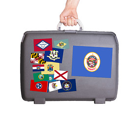 Image showing Used plastic suitcase with stains and scratches