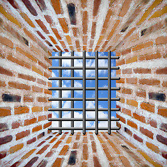 Image showing Prison's window and bars in wall from brick