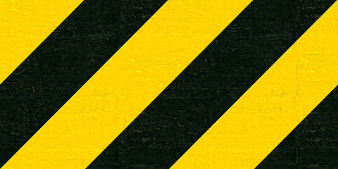 Image showing Warning black and yellow hazard stripes texture