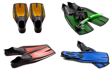 Image showing Set of multicolored swim fins, mask, snorkel for diving with wat