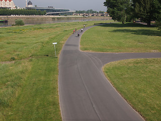 Image showing People walking in bankside park