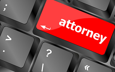 Image showing attorney word on keyboard key, notebook computer