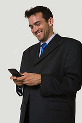 Image showing Reading a funny text message