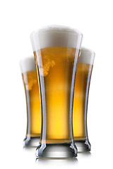 Image showing Beer in glass isolated on white