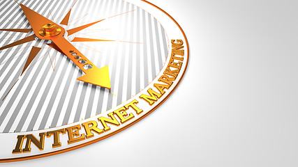 Image showing Internet Marketing on White with Golden Compass.