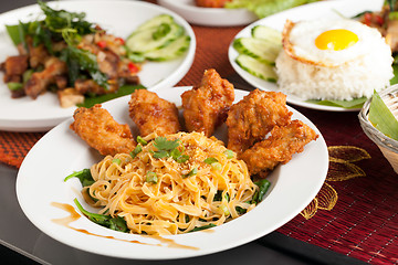 Image showing Thai Fried Chicken Wings with Noodles