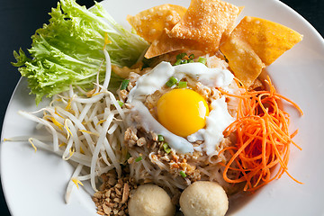 Image showing Thai Noodle Dish with Fried Egg