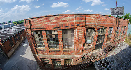 Image showing orld brick building in abandoned neighborhood alley