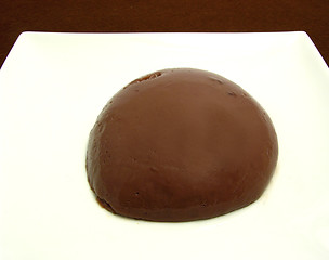 Image showing Chocolate pudding arranged on a white plate