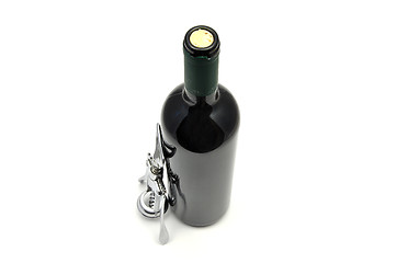 Image showing Red wine and corkscrew