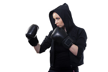 Image showing Young woman in boxing gloves on a white background