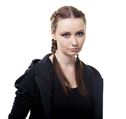 Image showing Portrait of a serious young woman on a white background