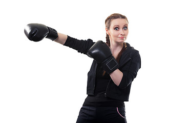 Image showing Young woman in boxing gloves on a white background